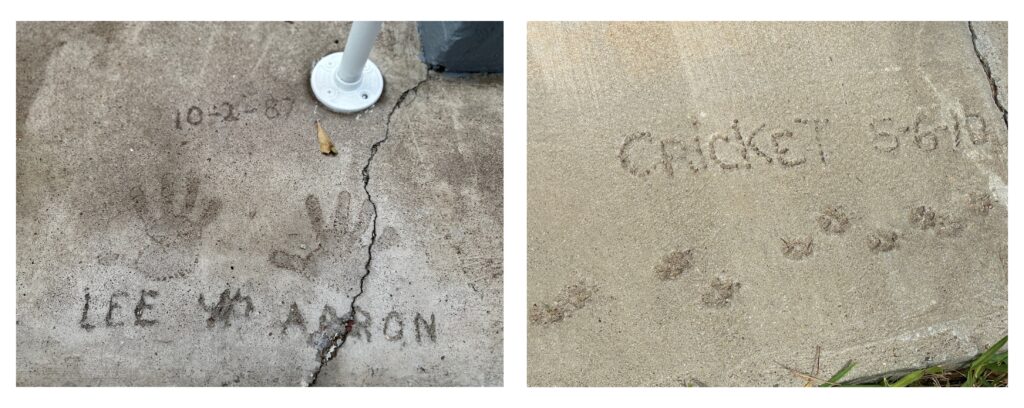 Handprints left by Lee and Aaron in concrete in 1987, alongside paw prints left by Cricket, a small dog, in 2010, at the Kincaid-Wade House.